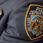 NYPD says officer who guards mayor’s home is suspended after shooting a man while off duty