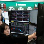 Asian shares mostly gain while European trading stays closed for a holiday