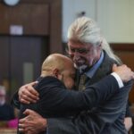 Judge tosses murder conviction for man who served 25 years