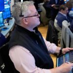 Oil prices jump and Wall Street slides with US, Iran clashing in the Strait of Hormuz