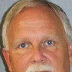 Brothers are accused of mishandling remains of two dozen people at Colorado funeral home