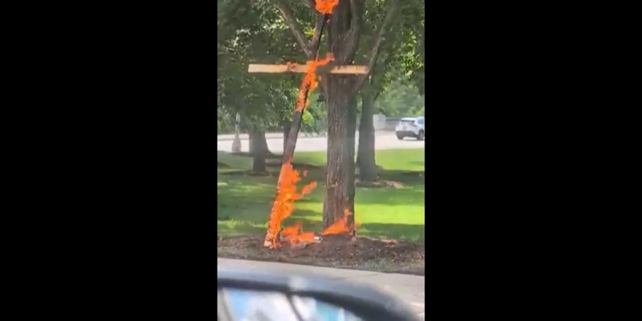 Man who admitted setting cross on fire in Chicago park is charged with a hate crime