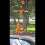 Man who admitted setting cross on fire in Chicago park is charged with a hate crime