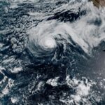 Hurricane Genevieve roars in the Pacific as Fausto weakens to a tropical storm