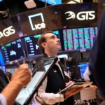 US futures climb after Fed takes a hawkish turn on inflation